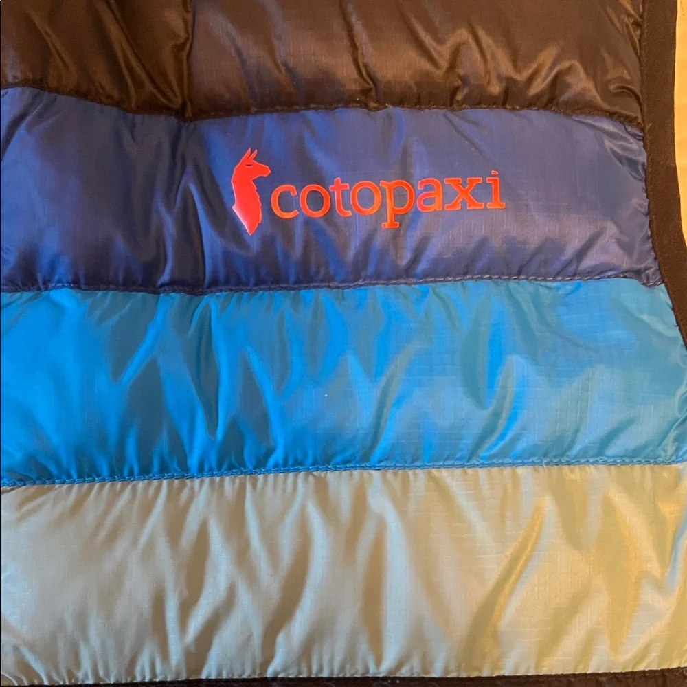 Cotopaxi Black and Blue Puffer Vest with Green Stripe - Picture 3 of 6